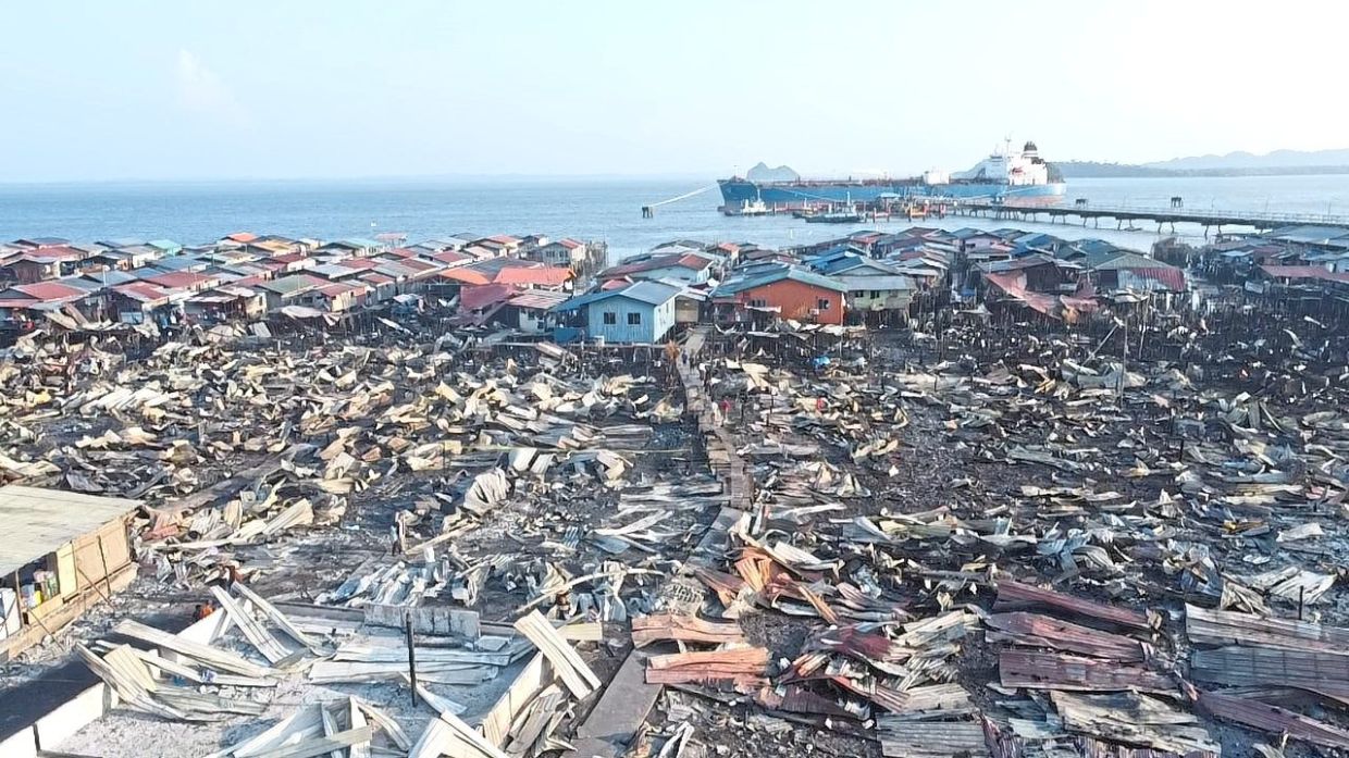 The scene after a fire ravaged a squatter colony in Kampung Bahagia, Sandakan, on April 19.