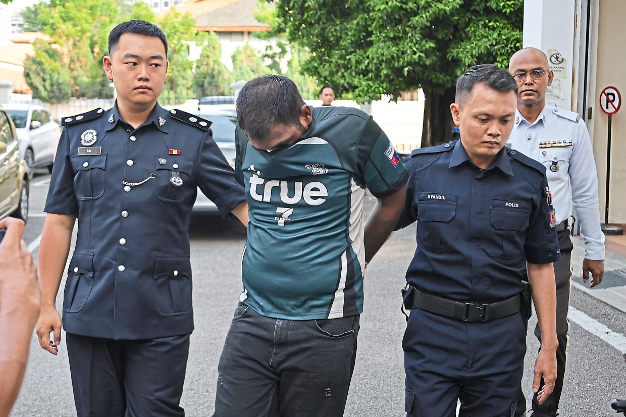 A coffee shop assistant who allegedly damaged 12 vehicles during a 20km police chase pleaded not guilty to 14 charges in two Magistrates’ Courts at George Town.