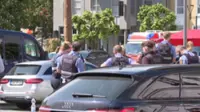 Hostages in German bank branch released but suspect at large