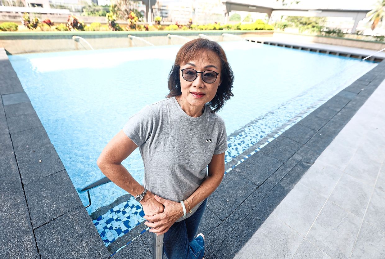 Tan spends long hours supporting young athletes and has become a mother figure to many of them.