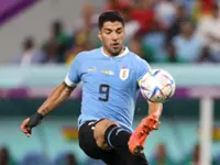 Soccer-Suarez open to Uruguay return for World Cup