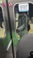 Man under fire for delaying train in Seoul with umbrella