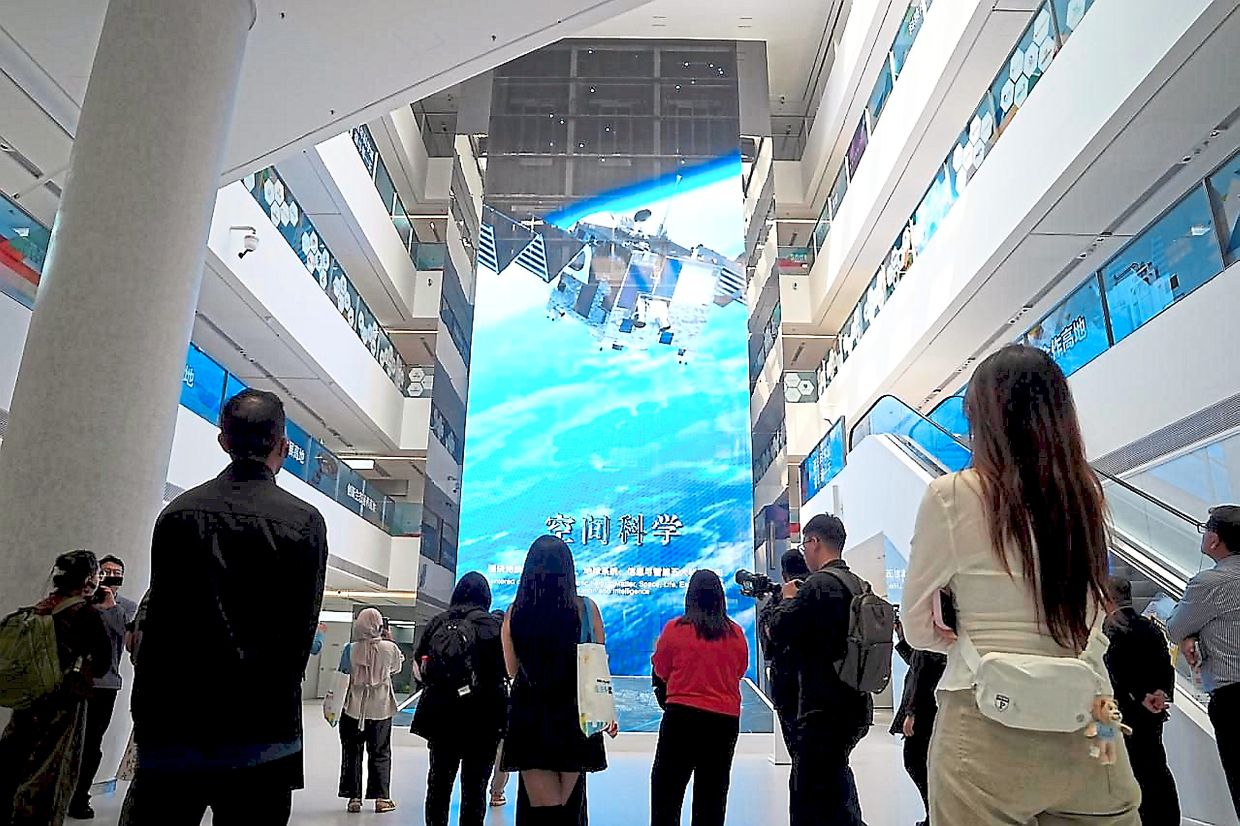 Journalists from Apec member economies visiting Huairou Science City during a study tour ahead of the Apec China 2026 summit. — Photos provided