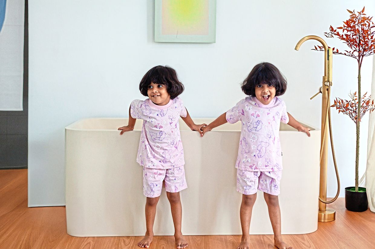 Kumitha’s twins are also involved in the business, as eager models. — Photo courtesy of Kumitha Manivanan