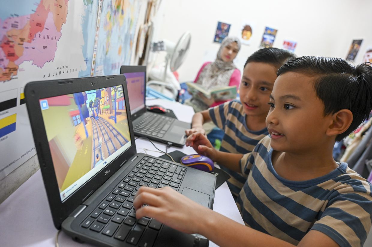 Balancing textbooks with bedtime stories, lectures with lunchboxes and examinations with everyday errands is no small feat. — IZZRAFIQ ALIAS/The Star