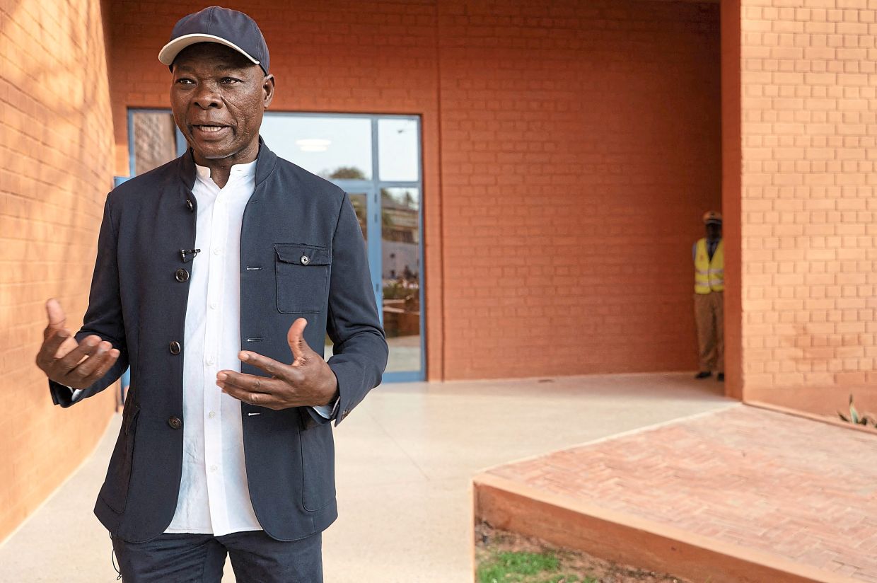 Kere speaks to members of the media at the cultural centre.