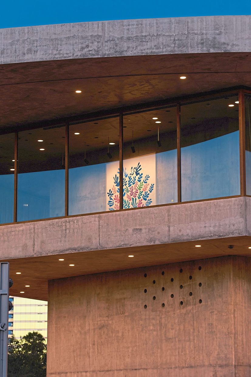 'La Gerbe' by Henri Matisse is seen through a wall of windows at the Los Angeles County Museum of Art.