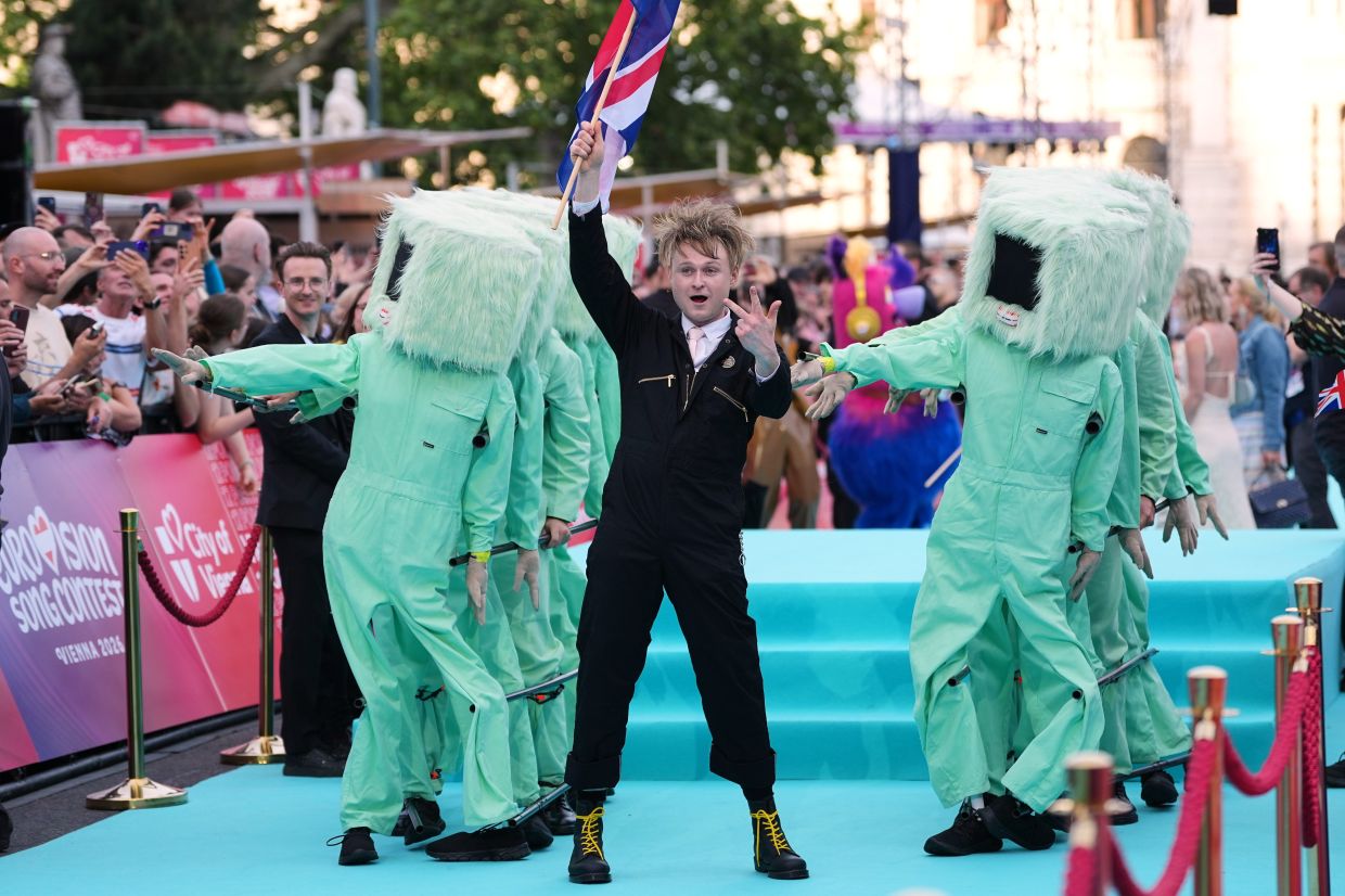 Artist Look Mum No Computer from Britain walking on the 'turquoise carpet' during the official start of the Eurovision Song Contest week in Vienna. -- MARTIN MEISSNER/AP