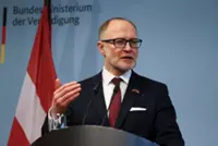 Latvian defence minister resigns after Ukrainian drones hit oil tanks