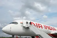 Air India to cut costs, reduce flights
