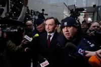 Poland says it wants answers after fugitive ex-minister leaves Hungary for US