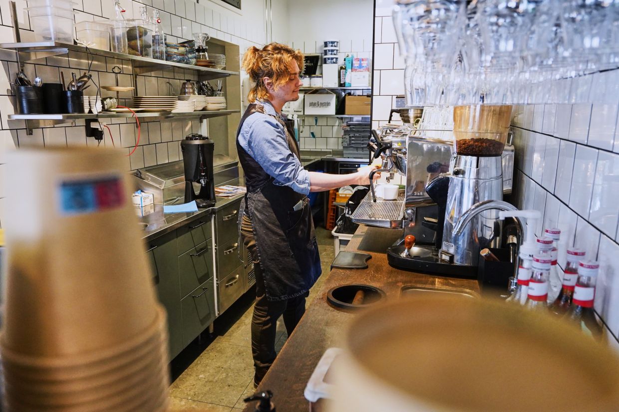 Barista Kajetan Grzelczak makes a coffee at Andon Café at the Vasastan neighborhood in Stockholm. — AP/James Brooks