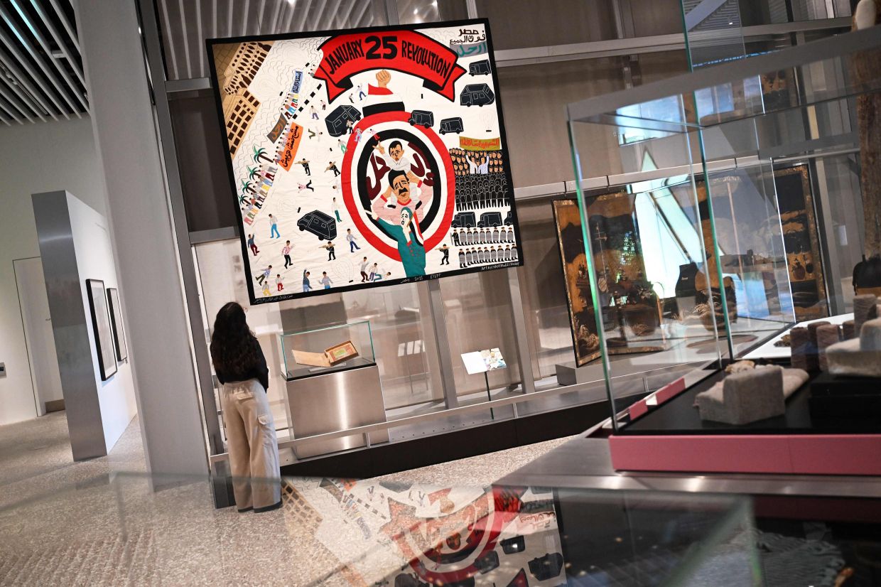 A view of the Second Revolution Khayyamiyya 2011-2012 exhibit by Egyptian artist Hany al-Sayed Ahmad Abd al-Kader on display the 'Music Is Black: A British Story' exhibition. Photo: AFP 