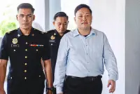 Ex-aide claims trial in smartboard fraud case