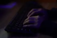 Australia watchdog says money launderers ramping up AI for scams