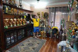 In Rio, artisan crafts World Cup trophies while hoping Brazil gets a real one