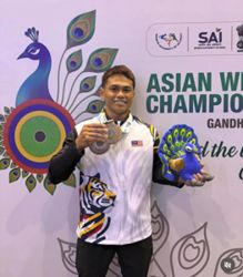 Aniq lifts spirits with silver ahead of C'wealth Games push