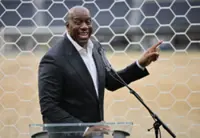 Soccer-Magic Johnson urges fans to make Los Angeles their World Cup destination