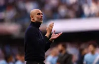 Soccer-Man City boss Guardiola says VAR decisions like the flip of a coin