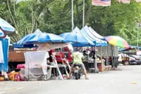 Govt to step up engagement after survey flags gaps in support for hawkers, small traders, says Fahmi