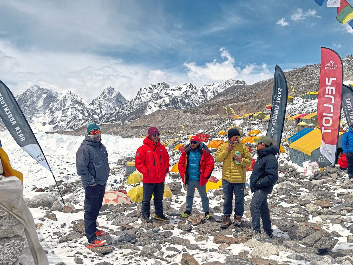 At least 12 members of a rope- fixing team made the ascent, marking the traditional start of the spring climbing window, expe­dition organisers said.