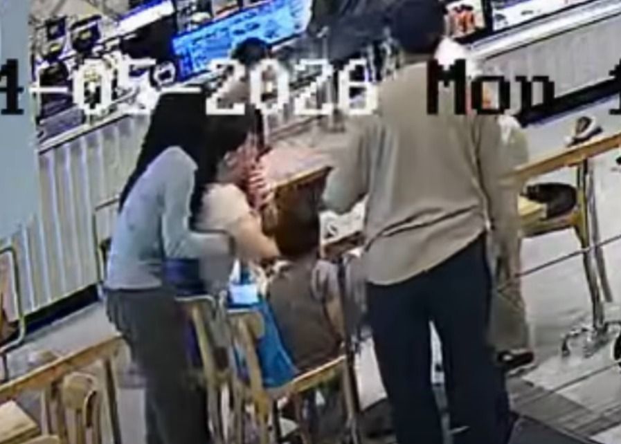 In the video, a woman can be seen rushing to the aid of another woman who suddenly started choking while eating at what looks to be a cafeteria.

Is it true?
