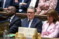Senior UK minister resigns, calls for a leadership contest to oust PM Starmer
