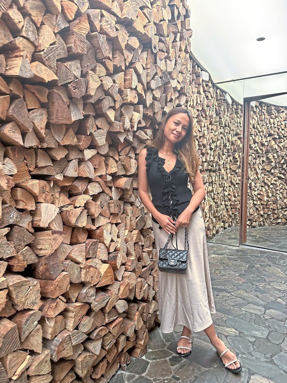 Her personal style is a uniform of practical, minimal and sleek styles. Photo: Reem Shahwa