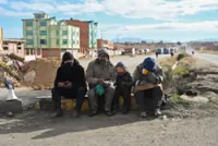 Bolivian miners clash with police in La Paz, demand president’s resignation