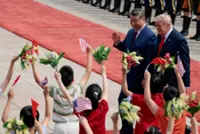 Trump and Xi set for second day of talks after Taiwan warning