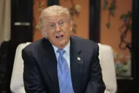 Bucking right-wing base, Trump defends Chinese students in US