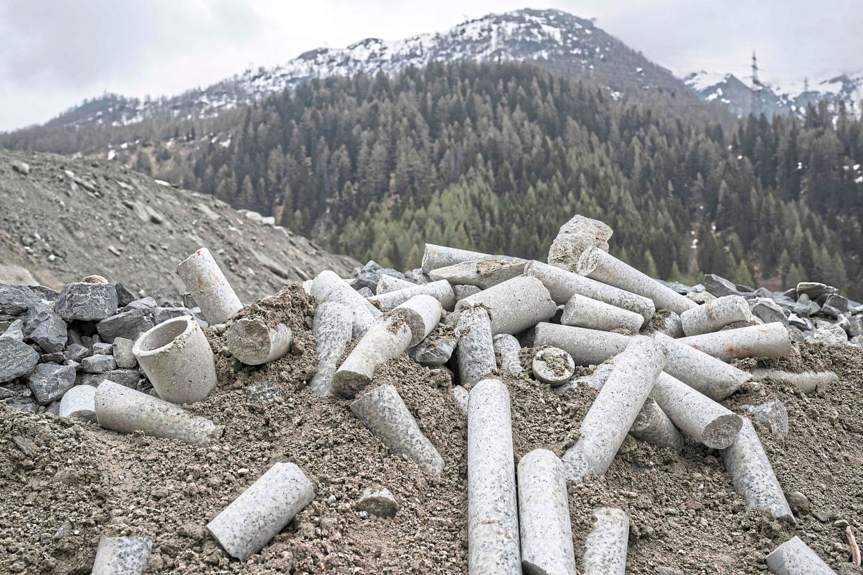 Boreholes piled up outside the tunnel entrance of the BedrettoLab.