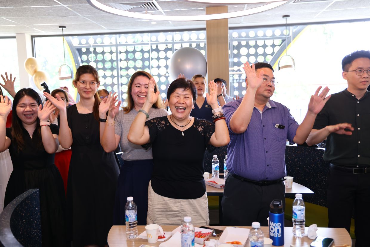 A moment away from lesson plans and grading: SJKC Chiao Nan educators enjoying a well-deserved breather during the Teachers' Day celebration.