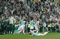 Soccer-Celtic snatch title from Hearts with last-gasp victory on final day