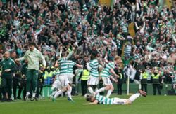 Soccer-Celtic snatch title from Hearts with last-gasp victory on final day
