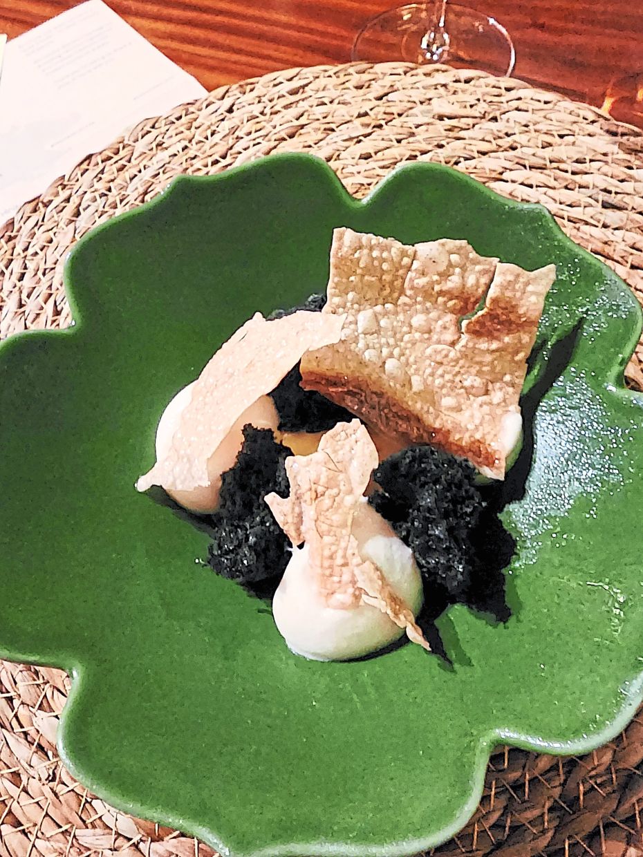The dessert is a tropical delight that features kelulut ice-cream, coconut foam and sweet potato working together in harmony.