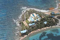 Epstein island's billionaire owner is battling zealous voyeurs