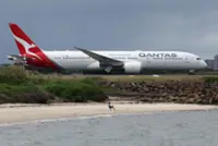 Qantas flight diverted after man bites flight attendant