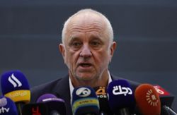 Soccer-Arnold urges Iraq to show fighting spirit at World Cup