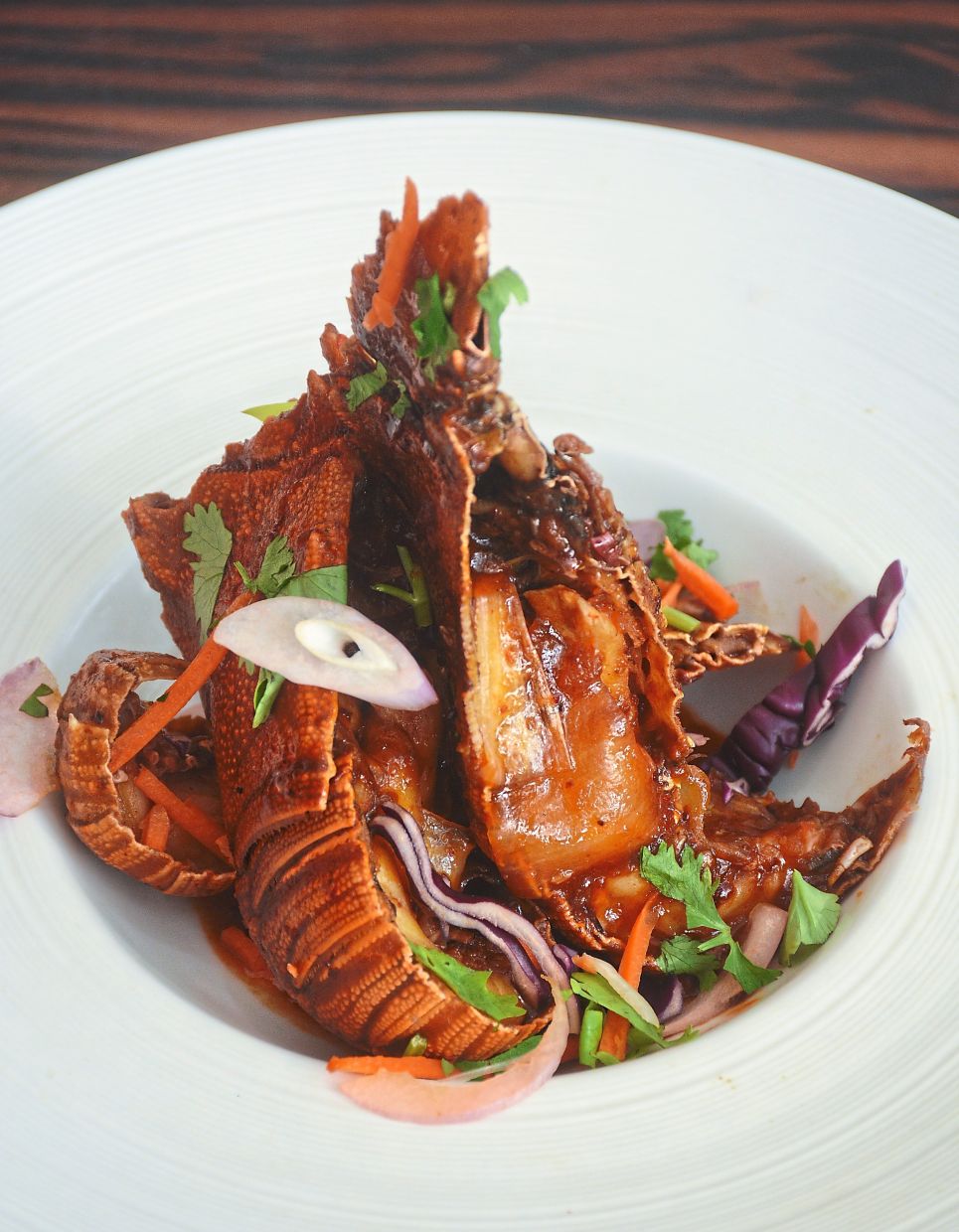 Wok-fried Kam Heong Lobster is among the featured oriental dishes.