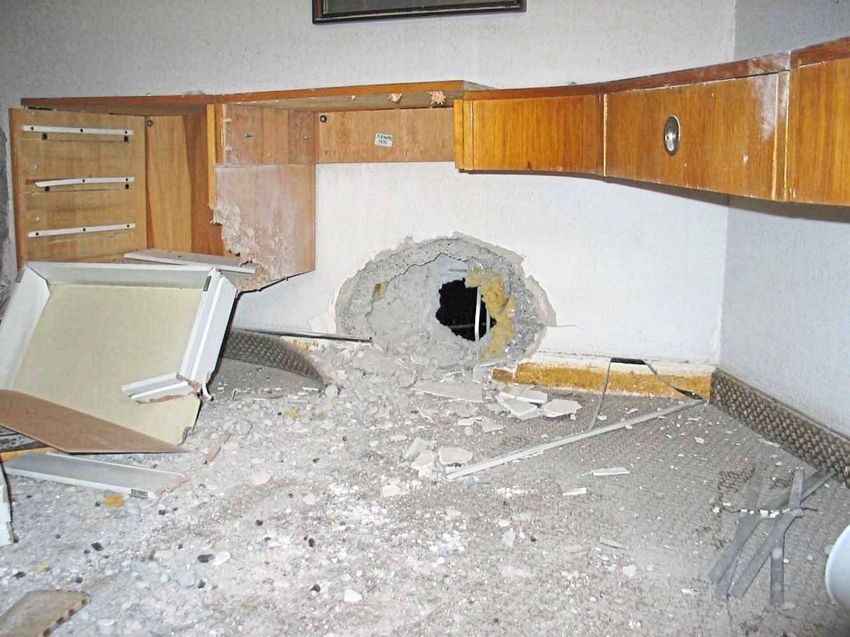 A room at the Palestine Hotel after a US tank fired at the building. The occupant survived the blast but was left shaken. — SHAHANAAZ HABIB/The Star