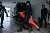 Suspect in woman's stabbing caught, remanded for seven days