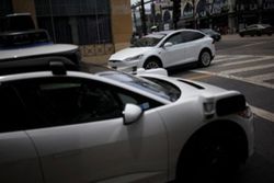 Tesla's Musk expects widespread use in US of cars without human monitors this year