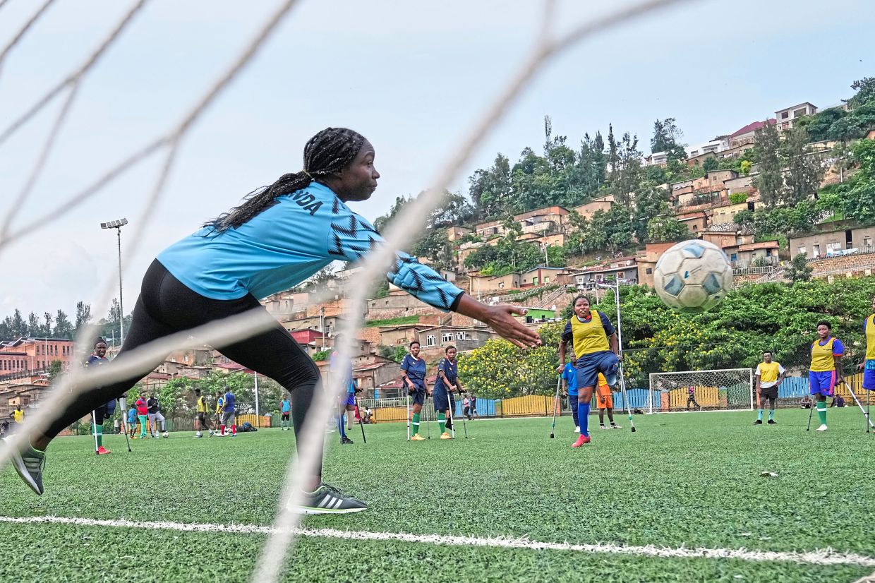 Amputee football is a seven-a-side version of the game in which players roam the field on crutches and goalkeepers have one arm. Photo: AFP