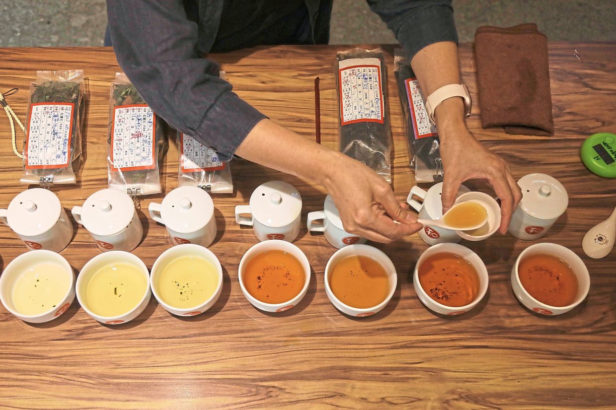 A tea maker prepares a variety of teas for visitors at Wagashi Forest. Photos: YAP CHEE HONG/The Star