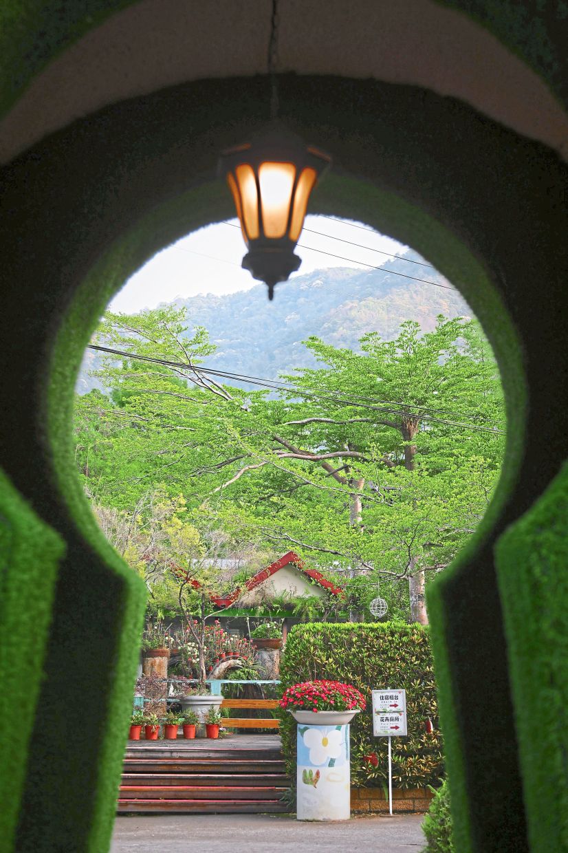 A keyhole-shaped door frames the sweeping 13.2ha grounds of Tai-Yi Ecological Leisure Farm, where the landscape shifts vividly with the seasons. Photos: YAP CHEE HONG/The Star