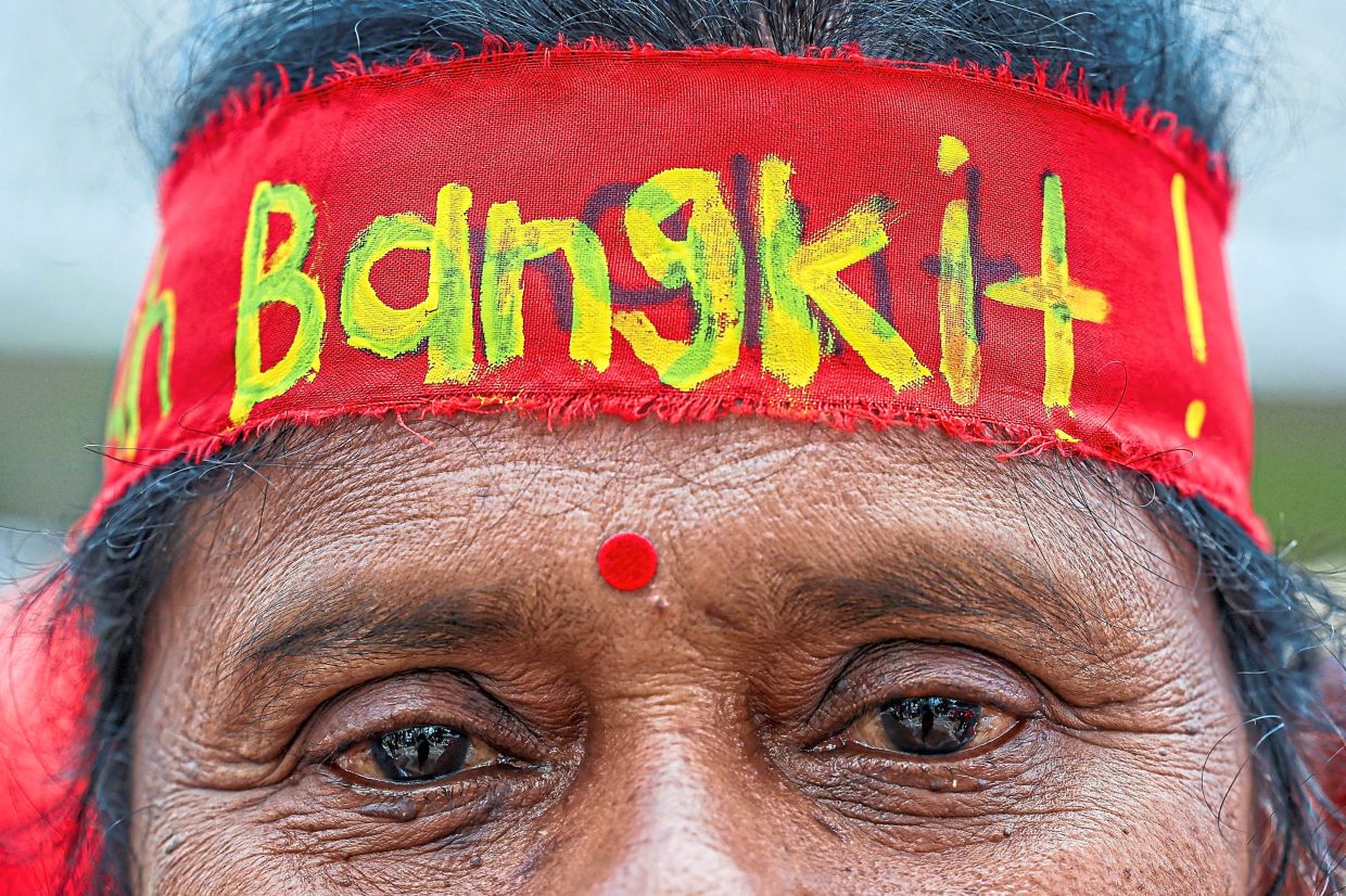 Close-up of a protester wearing a headband reading ‘Bangkit’ (Rise), capturing the spirit of the demonstration. — Reuters