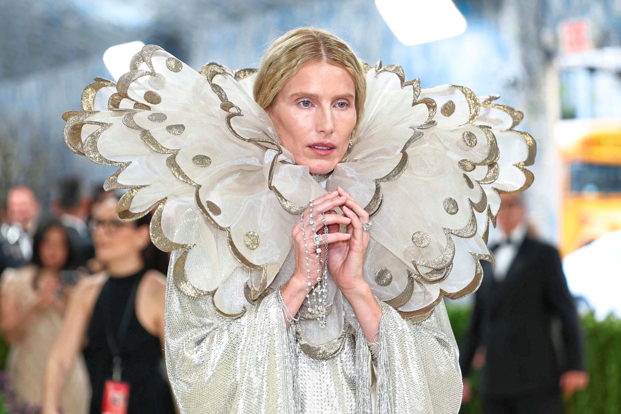 US model and actress Dree Hemingway made an ethereal statement with a custom gown by Alessandro Michele for Valentino, delivering an otherworldly red carpet moment. — AFP