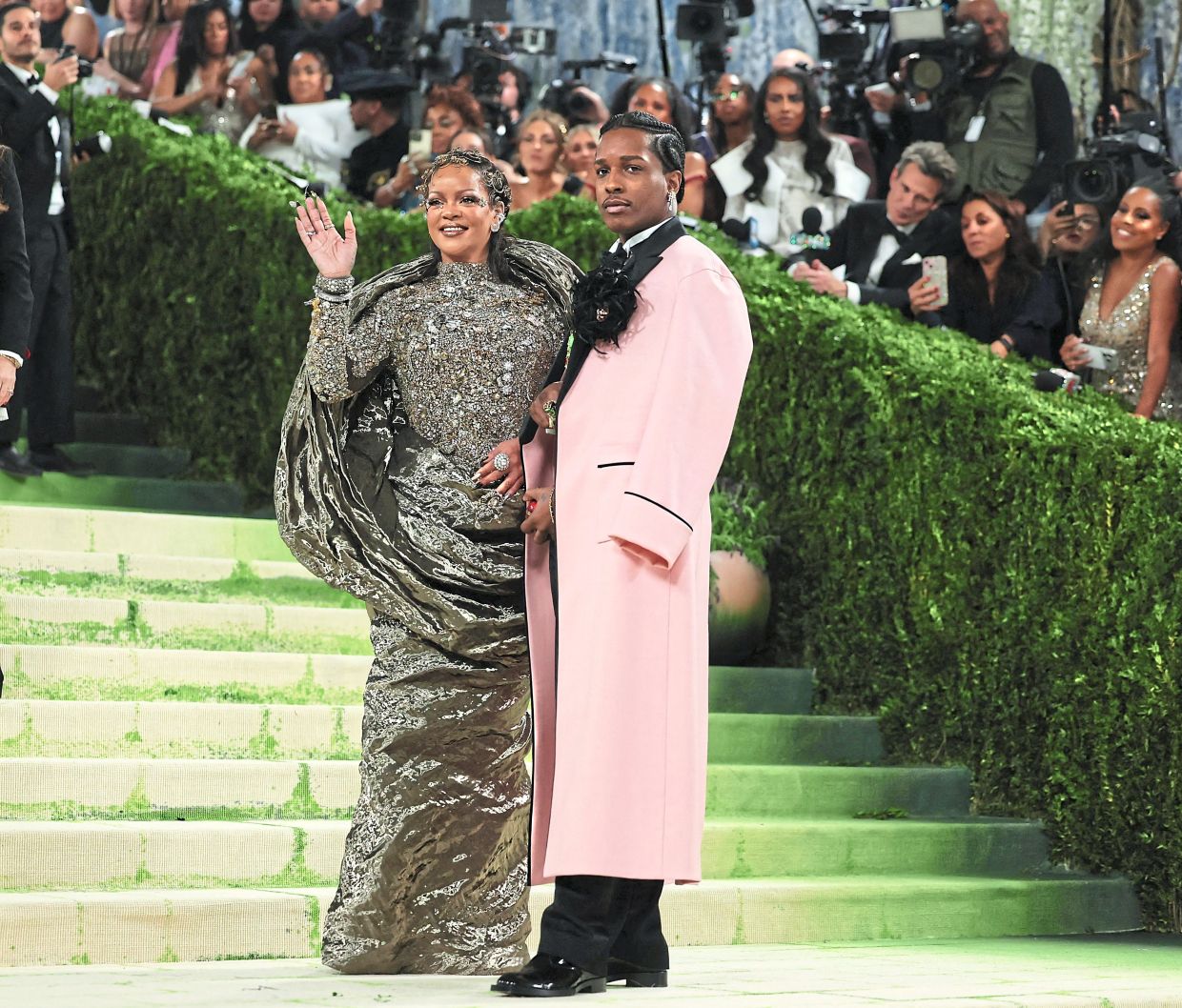 Barbadian singer and businesswoman Rihanna and US rapper A$AP Rocky closed out the red carpet in commanding style, with Rihanna appearing as a breathtaking ‘living sculpture’ in a custom Maison Margiela Artisanal gown by Glenn Martens. The avant-garde ensemble fused medieval drama with futuristic industrial flair. Rocky followed closely behind in a custom look by Matthieu Blazy for Chanel, featuring a pink wool robe with black satin lapels, black piping and a silk-and-feather camellia and Chanel High Jewelry. — Reuters