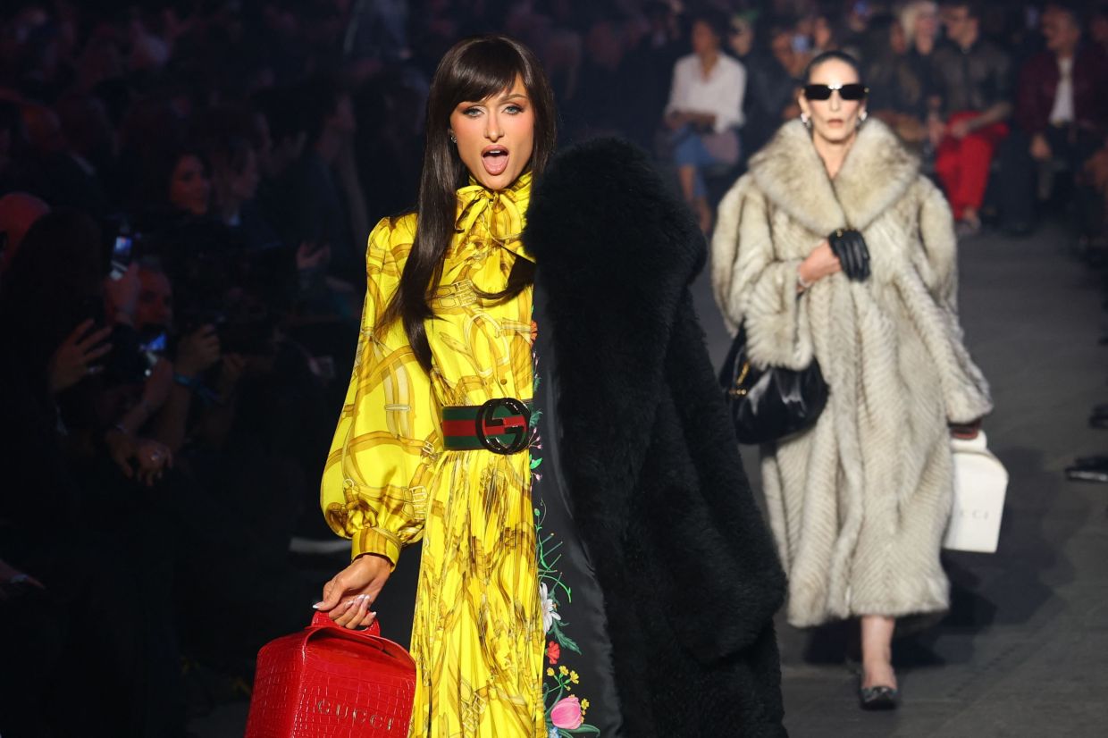 Paris Hilton walks the runway during the Gucci Cruise 2027 collection fashion show. Photo: AFP